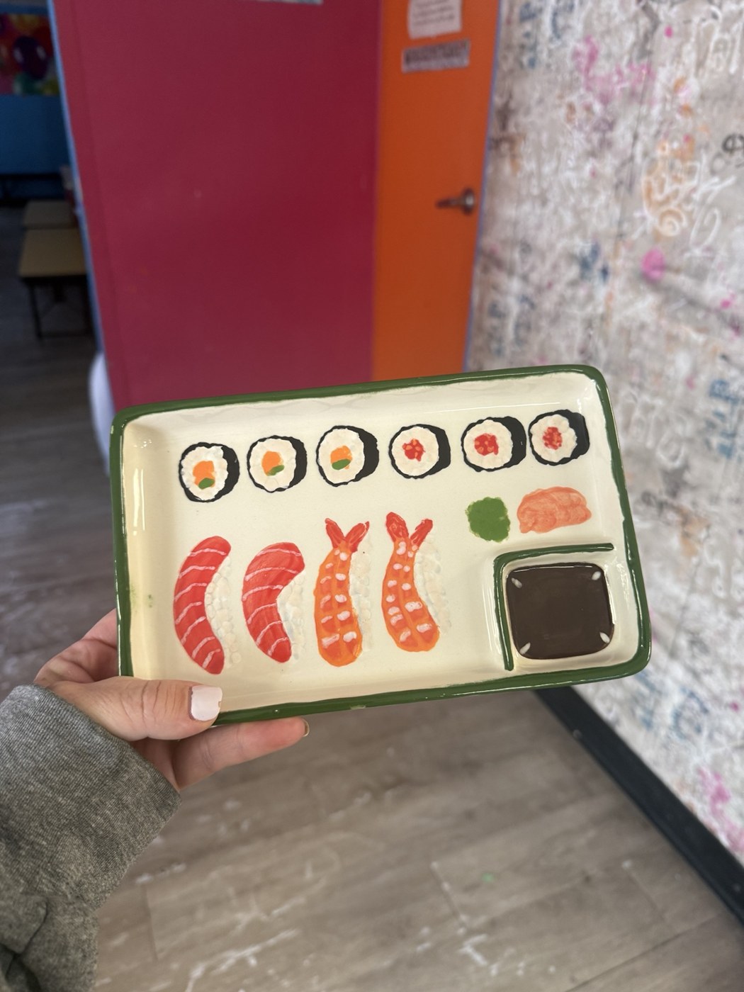 Hand-painted tray decorated with colorful sushi